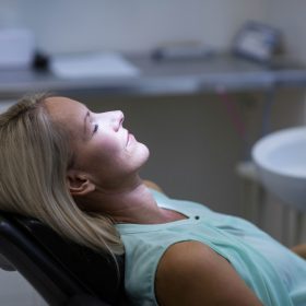 woman-relaxing-in-a-dental-chair-during-appointmen-2026-03-25-06-01-33-utc